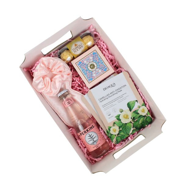 Box Día de Spa para Mujer de Dulce Regalo. Caja spa con mascarillas, jabón artesanal, bebida pink soda, accesorios y chocolate. Regalo ideal para un día de cuidado personal con entrega a domicilio en Lima.